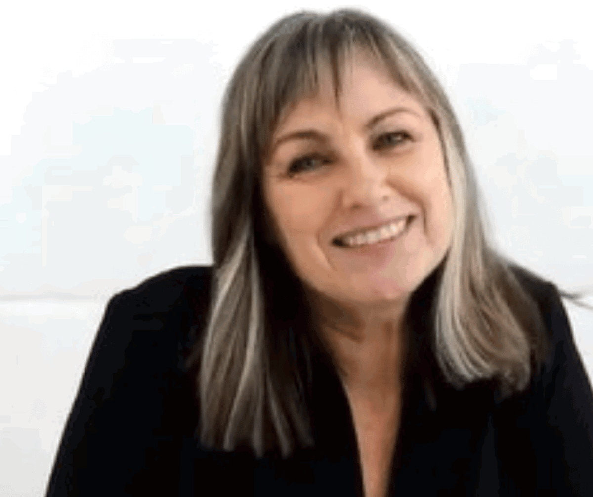 Client testimonial of Lyn who is smiling